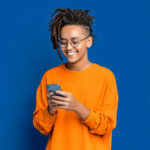 adult-ex-drug-user-wearing-a-orange-shirt-smiling-